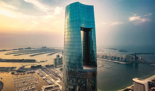 Aerial view of the 373.5-meter Ciel Tower in Dubai Marina, utilizing premium weatherproofing joint fillers and architectural sealants to withstand high-altitude negative wind pressure and extreme Middle Eastern climate displacement.