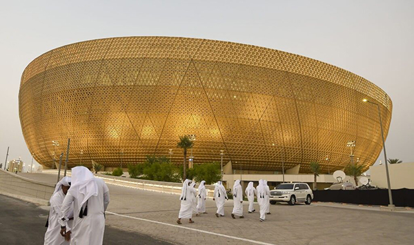 Golden Lusail Stadium Qatar 2022 FIFA World Cup main venue exterior view, iconic desert climate landmark built with high-performance construction sealants and adhesives