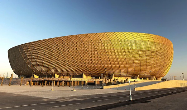 Golden Lusail Stadium Qatar 2022 FIFA World Cup main venue exterior facade, built for desert climate using INGADA high-performance MS polymer sealants for extreme temperature resistance
