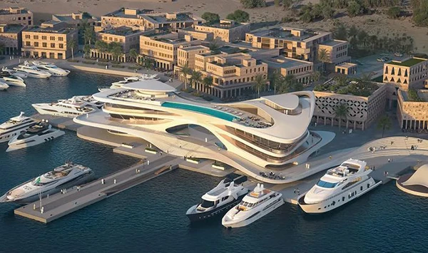 Futuristic aerodynamic architectural design of the completed Amaala Triple Bay Yacht Club marina, demonstrating complex fluid-shaped building facades requiring advanced low-modulus MS polymer sealants for high-movement joint protection.
